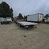 red 2001 International 4700/ Century Tilt Load