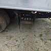 red 2001 International 4700/ Century Tilt Load