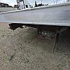red 2001 International 4700/ Century Tilt Load