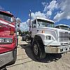 wht Freightliner FL80 at Dobson Sales